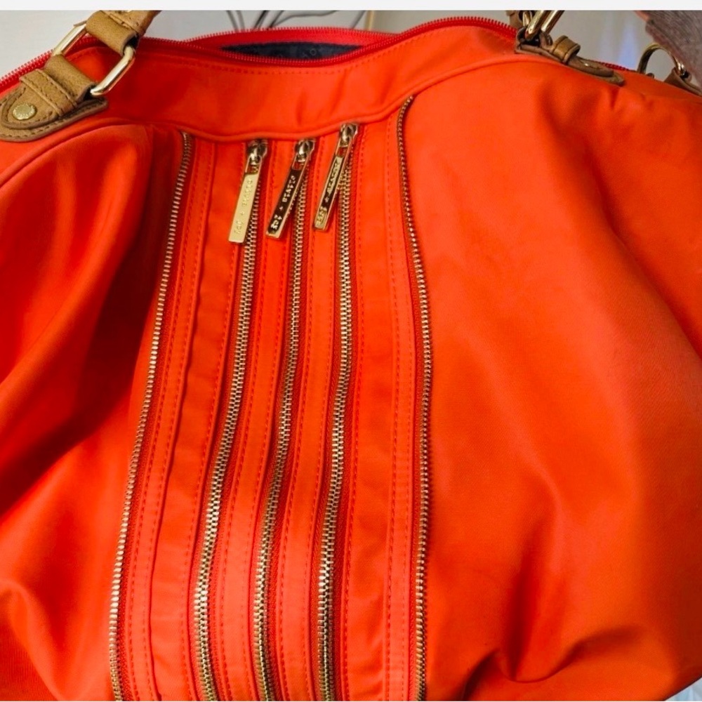 Olivia + Joy Chic Orange Shoulder Bag with Gold Accents - Picture 2 of 13